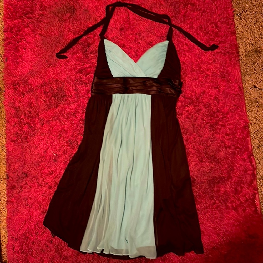 Brand new dress with tie strap on top and waist with tags
